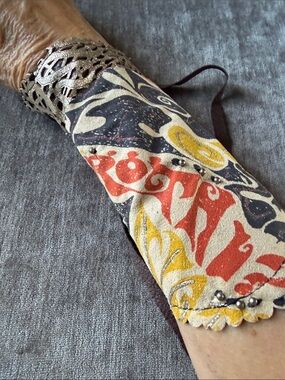 Colorful Printed Leather Wrist Cuff - Multi colour with metal looking studs .